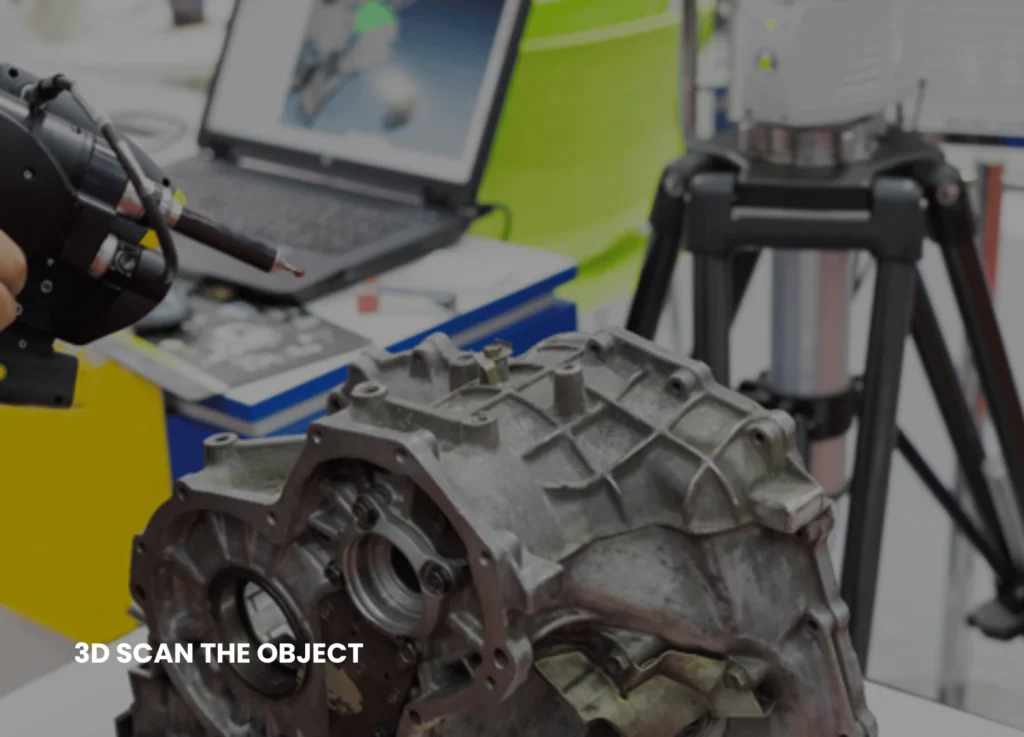 an engineer scanning the mechanical part for reverse engineering